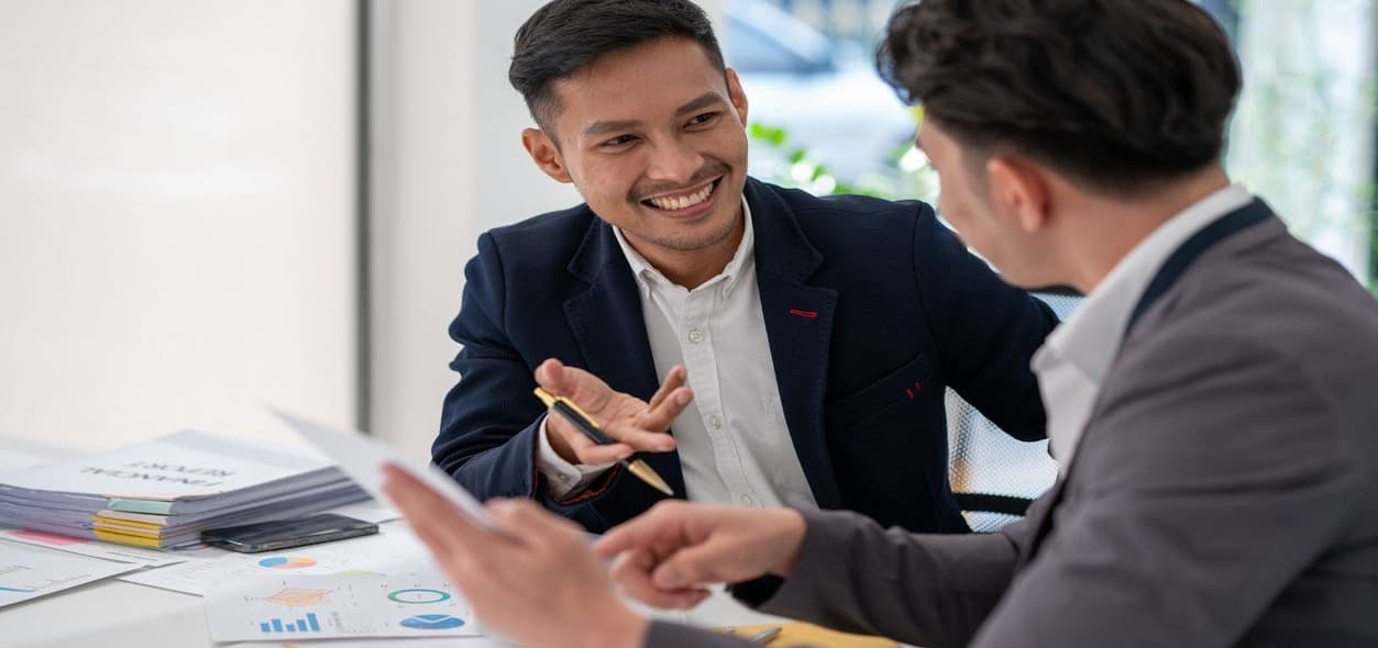 2 Co-workers Exchanging ideas during internship